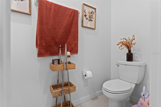 5994 Shiner St, Land O Lakes, FL 34638 - bathroom with tile patterned flooring, baseboards, and toilet