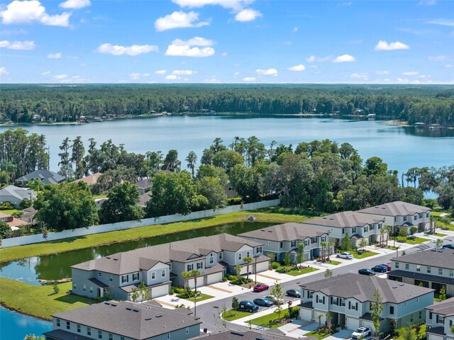 5994 Shiner St, Land O Lakes, FL 34638 - birds eye view of property featuring a water view, a residential view, and a view of trees