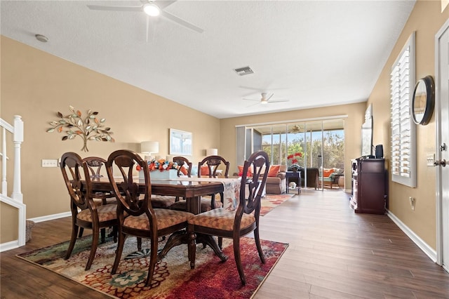 2824 Conch Hollow Dr, Brandon, FL 33511 - dining area featuring visible vents, ceiling fan, baseboards, and wood finished floors