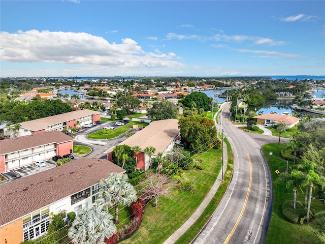 aerial view featuring a residential view and a water view