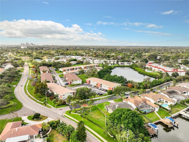 aerial view with a water view and a residential view