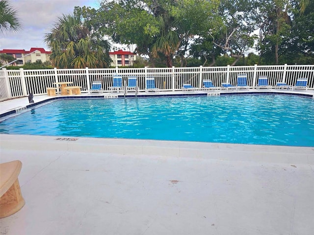 community pool with fence