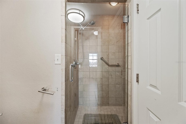 bathroom featuring a stall shower