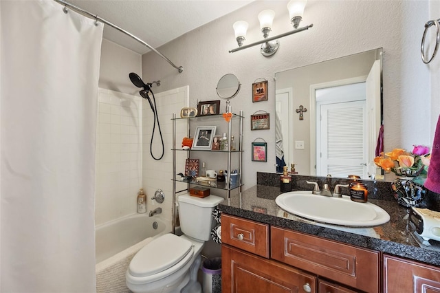 bathroom featuring toilet, shower / tub combo with curtain, and vanity