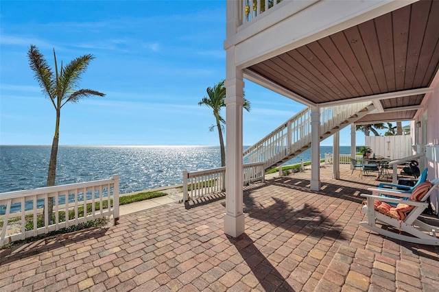 view of patio / terrace featuring a water view