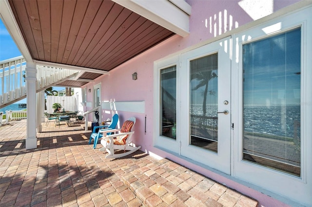 view of patio featuring fence