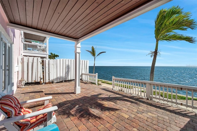 view of patio / terrace with a water view