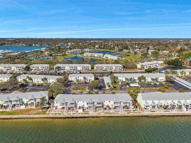 bird's eye view with a residential view and a water view