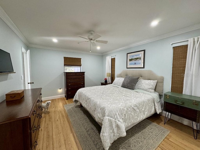 bedroom with ceiling fan, recessed lighting, baseboards, light wood-style floors, and crown molding