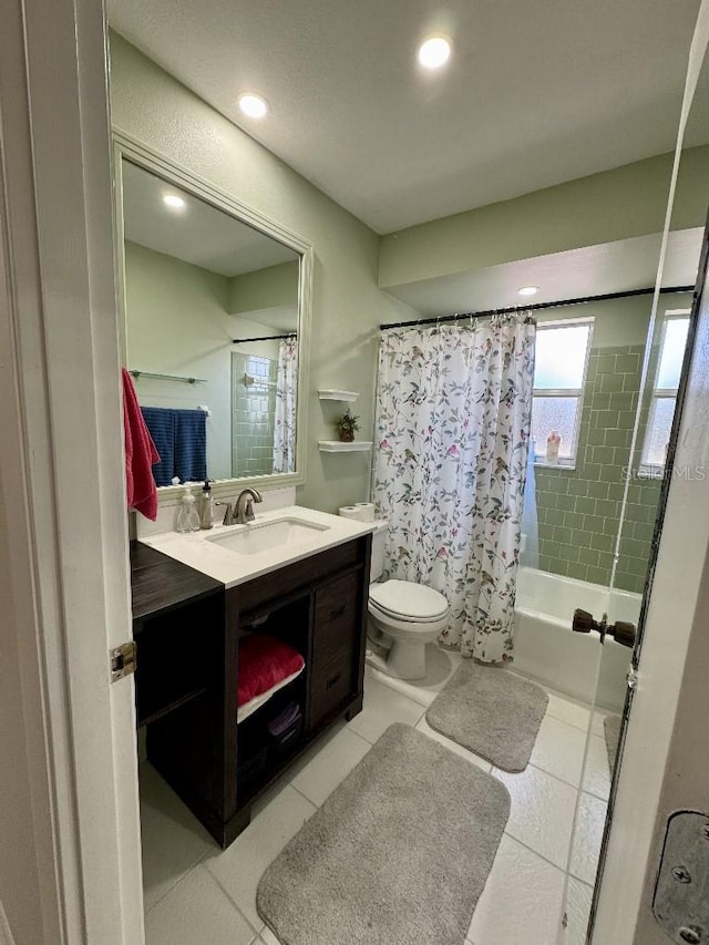 full bathroom with tile patterned flooring, toilet, recessed lighting, vanity, and shower / bath combo