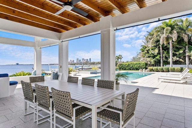 611 Brightwaters Blvd NE, Saint Petersburg, FL 33704 - view of patio with outdoor dining space, an outdoor pool, a water view, and ceiling fan