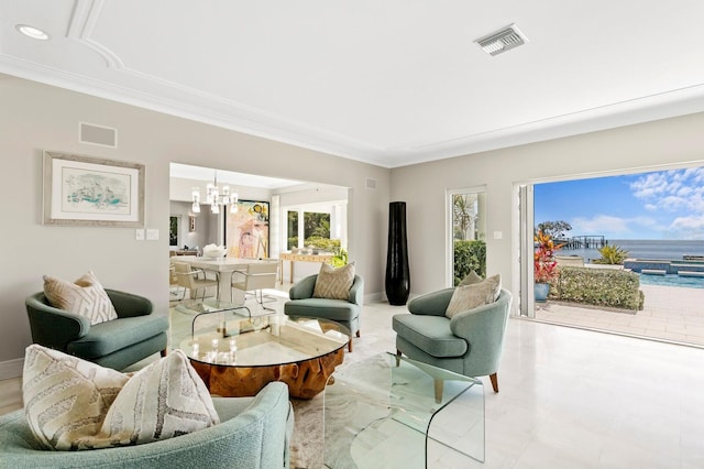 611 Brightwaters Blvd NE, Saint Petersburg, FL 33704 - living area with ornamental molding, visible vents, and an inviting chandelier