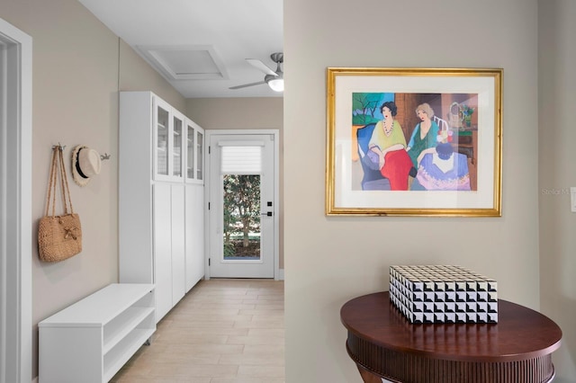 611 Brightwaters Blvd NE, Saint Petersburg, FL 33704 - mudroom featuring light wood finished floors and attic access