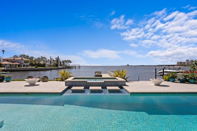 611 Brightwaters Blvd NE, Saint Petersburg, FL 33704 - pool featuring a water view and a patio