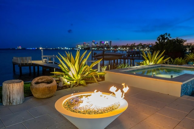 611 Brightwaters Blvd NE, Saint Petersburg, FL 33704 - view of patio featuring an in ground hot tub and a boat dock