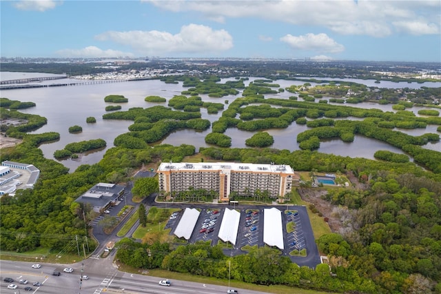 drone / aerial view with a water view