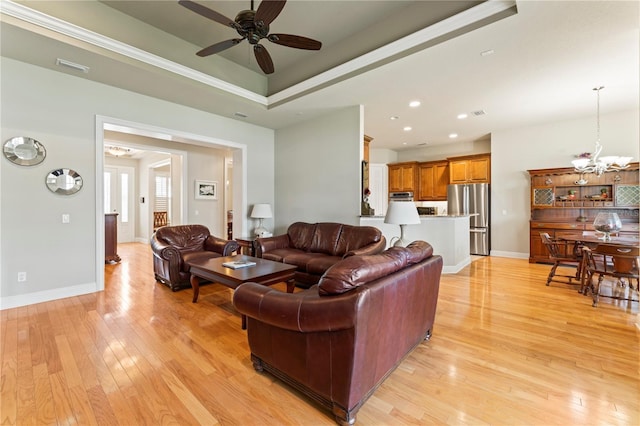 living area featuring recessed lighting, visible vents, light wood-style flooring, and baseboards