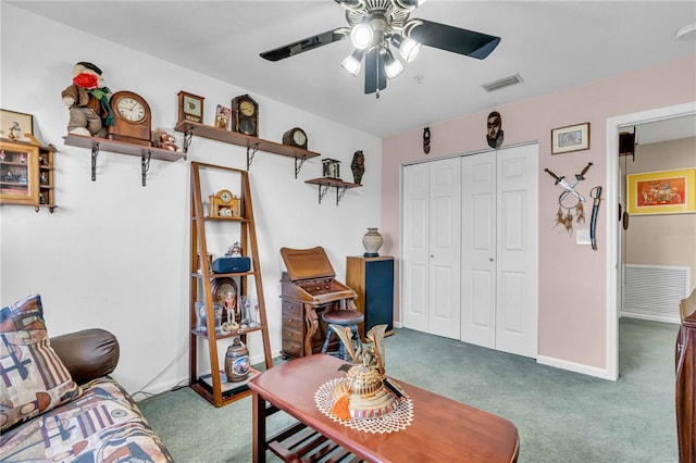 interior space featuring ceiling fan, visible vents, and baseboards