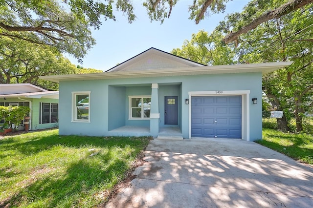 ranch-style house featuring concrete driveway, a front lawn, an attached garage, and stucco siding