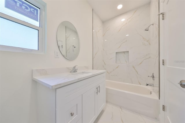 full bath featuring marble finish floor, shower / tub combination, vanity, and recessed lighting