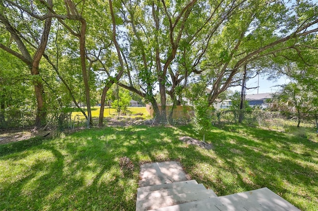 view of yard with fence