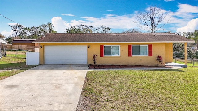 single story home with a garage, concrete driveway, fence, a front lawn, and stucco siding