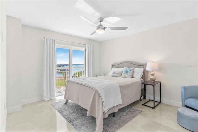 bedroom with access to exterior, ceiling fan, and baseboards