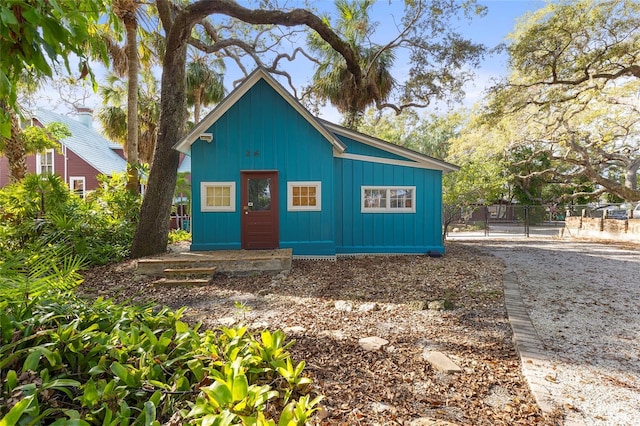 view of front of house with fence