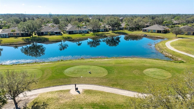 bird's eye view featuring a water view and a residential view