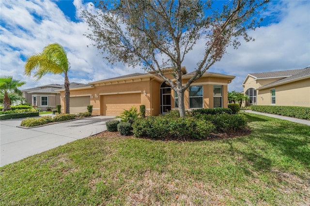 ranch-style home featuring a garage, concrete driveway, a front lawn, and stucco siding