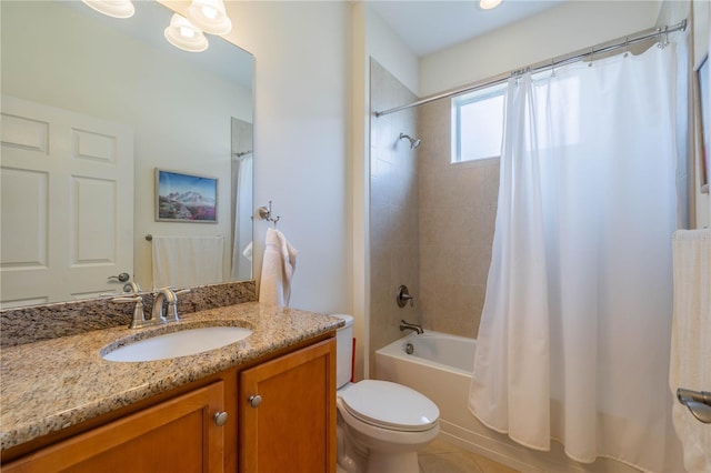 full bath with shower / bath combo, vanity, and toilet