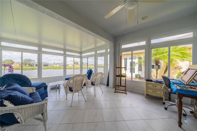 sunroom / solarium with a ceiling fan