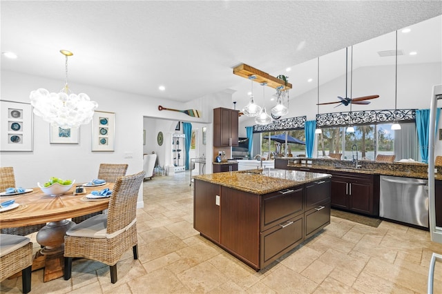 kitchen with a sink, stainless steel dishwasher, stone tile floors, and dark brown cabinetry