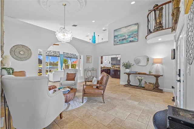 living room featuring baseboards, visible vents, a high ceiling, recessed lighting, and stone tile flooring