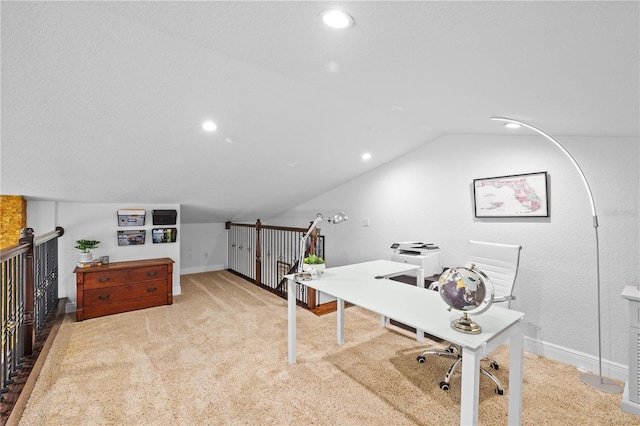 carpeted office space with vaulted ceiling, recessed lighting, and baseboards