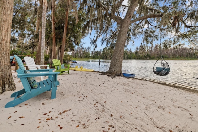 surrounding community featuring a water view