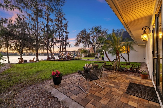 view of patio / terrace featuring a water view