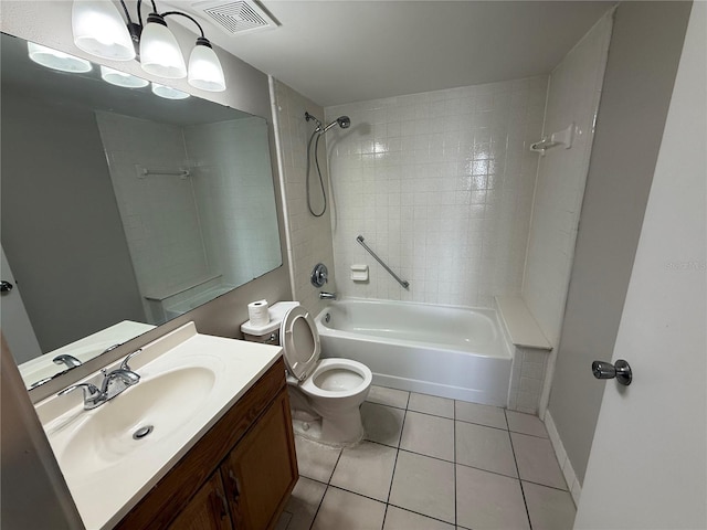 full bath with visible vents, toilet, tile patterned floors, vanity, and washtub / shower combination