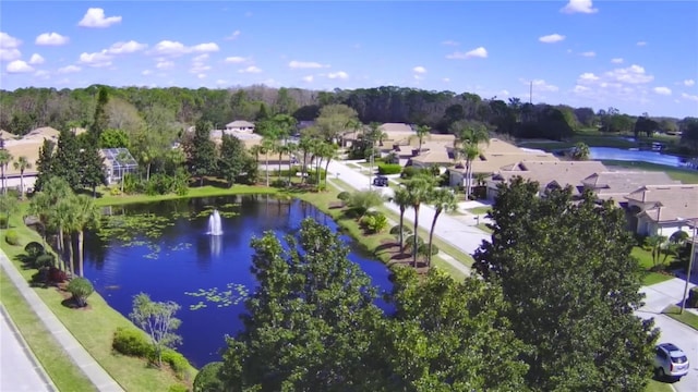 bird's eye view with a water view and a residential view