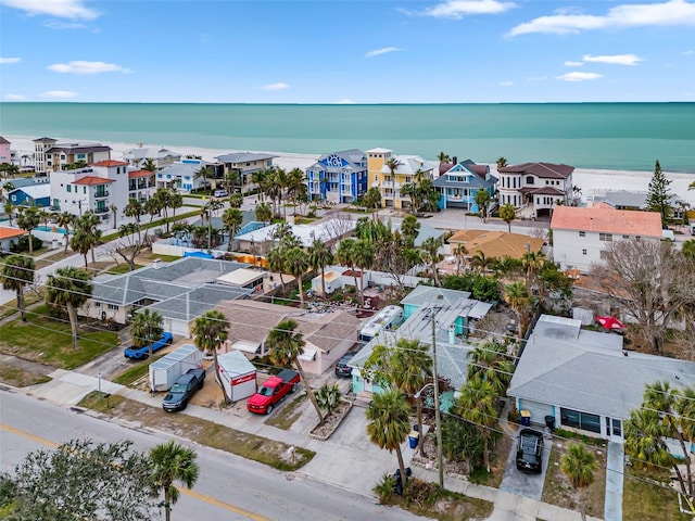 birds eye view of property featuring a water view and a residential view