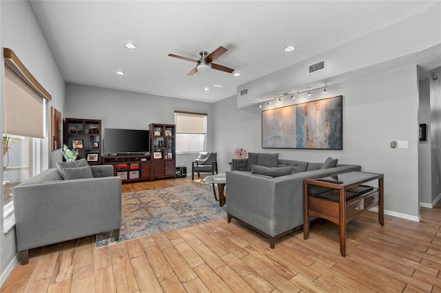 living area featuring recessed lighting, visible vents, a ceiling fan, light wood-type flooring, and baseboards