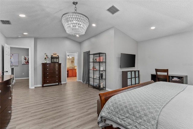 bedroom featuring lofted ceiling, wood finished floors, visible vents, and recessed lighting