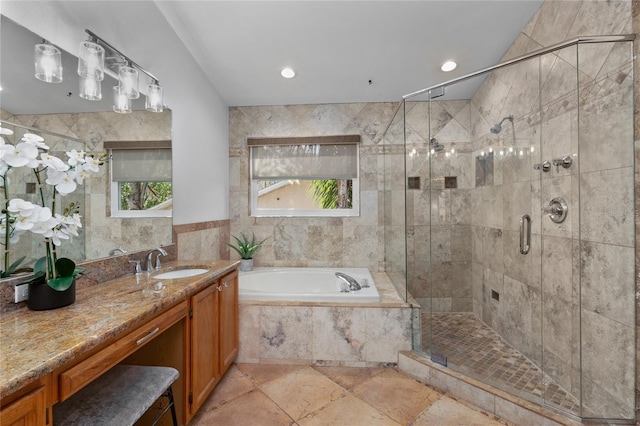 bathroom with a garden tub, recessed lighting, vanity, and a stall shower