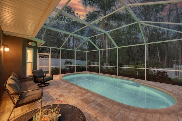 view of pool with a fenced in pool, a lanai, a patio area, and a fenced backyard