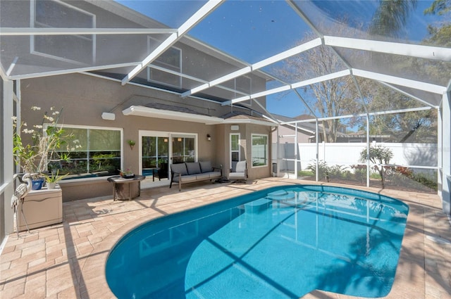 view of swimming pool with a fenced in pool, an outdoor hangout area, glass enclosure, a patio area, and fence