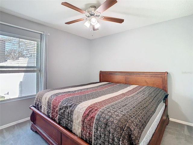 bedroom featuring carpet, ceiling fan, and baseboards