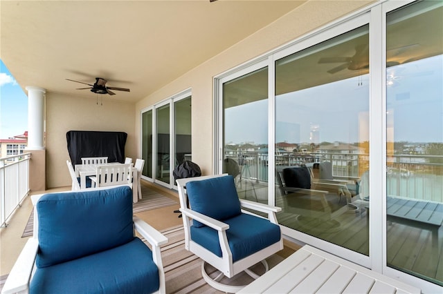 balcony featuring a ceiling fan