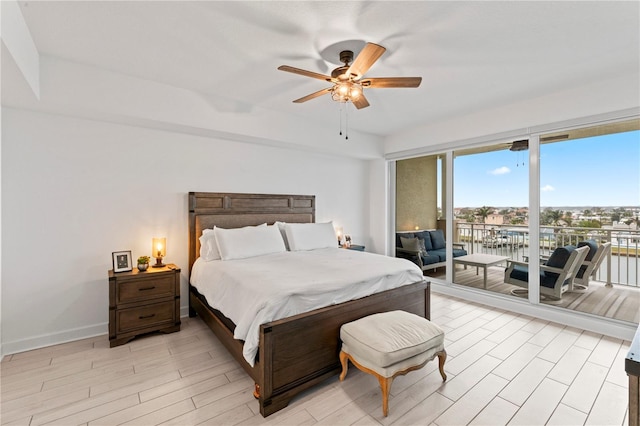 bedroom featuring light wood-type flooring, access to outside, baseboards, and a ceiling fan