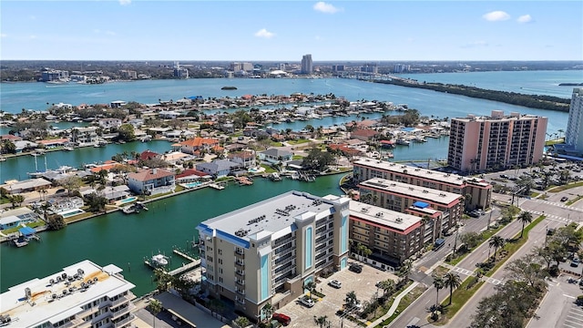 drone / aerial view featuring a water view and a city view