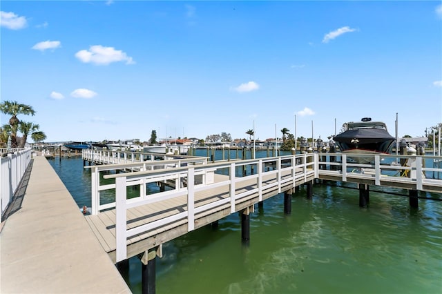 dock area featuring a water view and boat lift